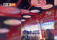 大爷怒斥夜市挂日本元素油纸伞 表示挂此举不妥