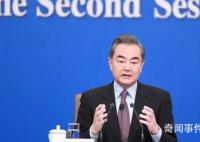 王毅会见美中关系全国委员会会长