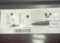 女子带父亲遗物登机被拘 查获的子弹为一枚未击发的步枪实弹