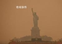雾霾笼罩纽约 自由女神像被“吞没”
