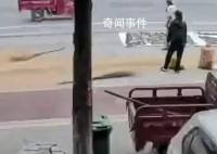 农民马路晒粮被洒水车喷水打湿 回应：道路禁止晒粮