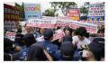 韩国大学生反对排海闯入日本使馆 警方认定这些人未经申报就擅自闯入大使馆建筑物